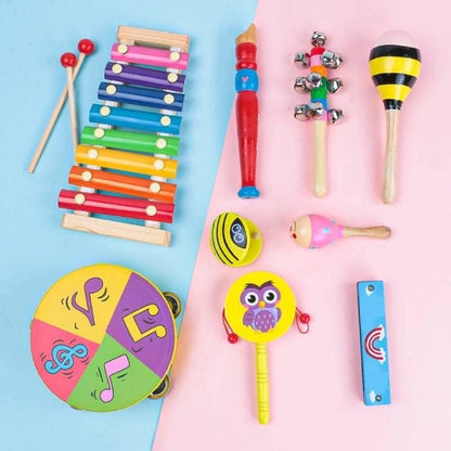 Set de 9 instrumentos musicales de madera en cajón
